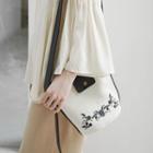 Buckled Embroidered Bucket Bag