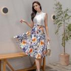 Set: Sleeveless Mock-neck Blouse + Floral Print Midi A-line Skirt