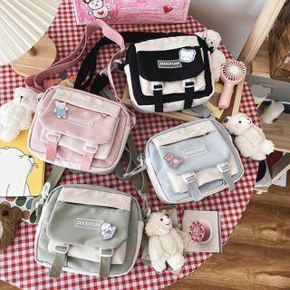 Two-tone Buckled Cross Bag