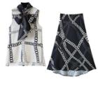 Sleeveless Tie-neck Chain Print Blouse / Midi A-line Skirt
