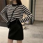 Striped Knit Top / Faux Leather A-line Skirt