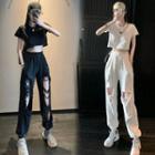 Short-sleeve T-shirt / Distressed Sweatpants
