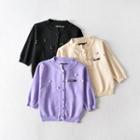 Short-sleeve Embellished Button Knit Top