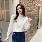 Ruffle Turtleneck Blouse