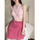 Sleeveless Irregular Crop Top / Buckled Mini A-line Skirt