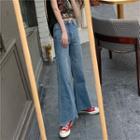 High-waist Asymmetric Frayed Jeans