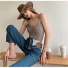 Knit Crop Top / Irregular Slim-fit Jeans