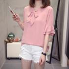 Short-sleeve Ruffled Cuff Tie-neck Blouse