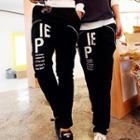 Zipped Lettering Couple Tapered Pants