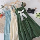 Square-neck Open-back Bow Pearl Spaghetti-strap Dress