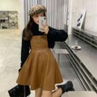 Turtleneck Sweater / Faux Leather Mini Overall Dress