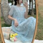 Set: Short-sleeve Ruffle Midi Smock Dress + Spaghetti Strap Floral Midi Dress