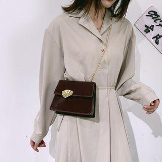 Patent Irregular Buckled Crossbody Bag