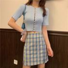 Faux Pearl Button Short-sleeve Cardigan / Plaid Mini A-line Skirt
