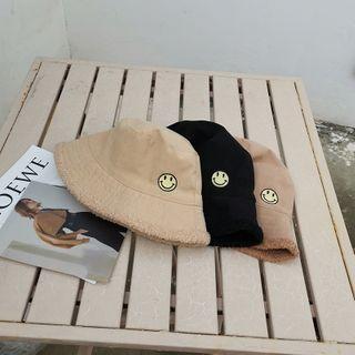 Embroidered Smiley Shearling Bucket Hat