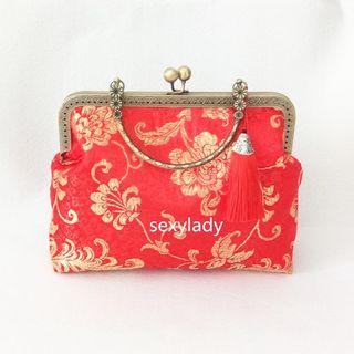Floral Print Tasseled Clipframe Handbag