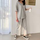 Set: V-neck Loose-fit T-shirt + Band-waist Wide-leg Pants