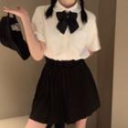 Short-sleeve Bow Shirt / Pleated A-line Skirt