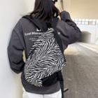 Zebra Print Buckled Backpack