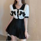 Short-sleeve Bow Accent Collared Knit Top / Mini Pleated Skirt