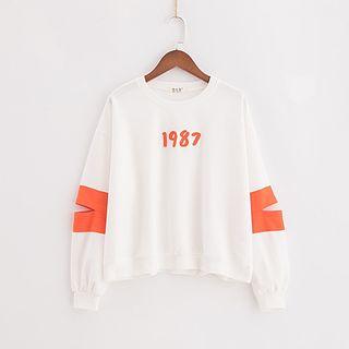 Cut-out Sleeve Color-block Top