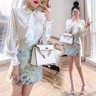 Set: Puff-sleeve Ruffled Blouse + Floral Print A-line Skirt