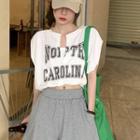 Sleeveless Mock Two-piece Lettering Crop Top