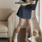 Hidden-button Stitched Denim Mini Skirt