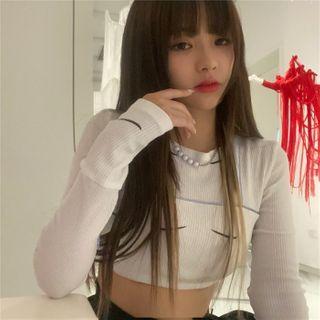 Long-sleeve Print Cropped Knit Top / High-waist Split Skort