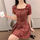 Set: Plaid Short-sleeve Cropped Top + Pleated Mini A-line Skirt