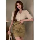 Flower-accent V-neck Shirt / Asymmetrical High-waist Mini Skirt