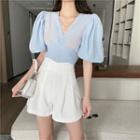 V-neck Puff-sleeve Blouse / High-waist Shorts