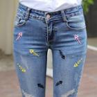 Distressed Embroidered Skinny Jeans