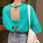 Short-sleeve Open-back T-shirt / Mini Layered Skirt