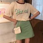 Letter-printed T-shirt / Plain High-waist A-line Skirt