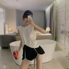 Sleeveless Open-back Knotted Top / Sweatshorts