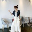 Set: Short-sleeve Bow Accent T-shirt + Midi Layered Skirt