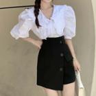 Set: Short-sleeve V-neck Blouse + Skorts
