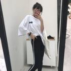 Printed 3/4-sleeve T-shirt / Piped Skinny Pants