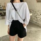 Lettering Cut-out 3/4-sleeve T-shirt / Drawstring Shorts
