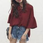 Flared-cuff Lace-up Blouse