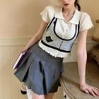 Crewneck Button-up Crop Top / Knit Two-tone Vest / High-waist Mini Skirt