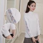 Mock-neck Embroidered Sweater / Plaid Mini Skirt / Set