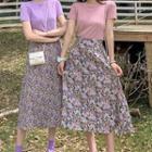 Set: Short-sleeve Plain T-shirt + Floral Print A-line Midi Skirt