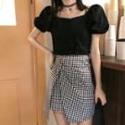 Short-sleeve Plain Blouse / Plaid Asymmetrical Hem Skirt