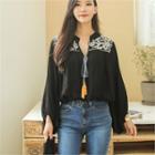 Open-placket Tasseled Embroidered Blouse