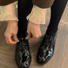 Oval-toe Faux-patent Oxfords