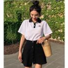 Set: Short-sleeve Lettering Polo Dress + Buttoned A-line Skirt