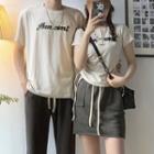 Couple Matching Short-sleeve Lettering T-shirt / Pants / Mini A-line Skirt