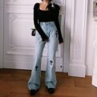 Cross Print Boot-cut Jeans